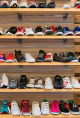 Big collection of different sport shoes.