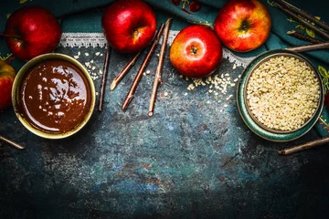 Gordijnen Ingredients for sweet chocolate  apples  making on rustic wooden dark baground, top view, border © VICUSCHKA