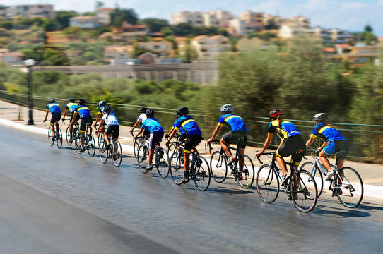 Cyclists During The Race On City Street.