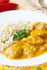 Chicken paprika and cream sauce, served with rice
