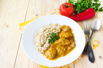 Chicken paprika and cream sauce, served with rice