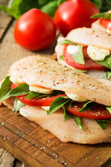 Raw chicken breasts stuffed with vegetables