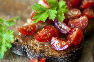 Italian bruschetta with cherry tomatoes on whole grain bread