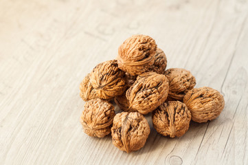 wallnuts on vintage wooden table