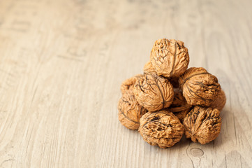 wallnuts on vintage wooden table