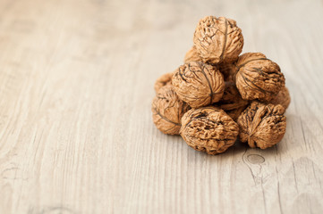 wallnuts on vintage wooden table