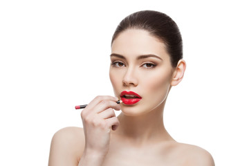Naklejka premium Beautiful girl with lip pencil