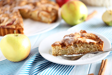 Homemade apple cake on blue wooden table