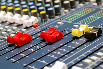 Volume control on the mixing console © valentinych