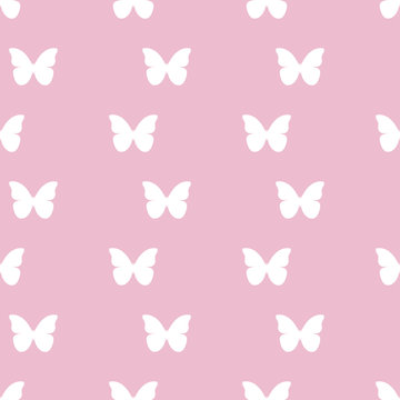 Seamless pattern with white butterflies on a pink background