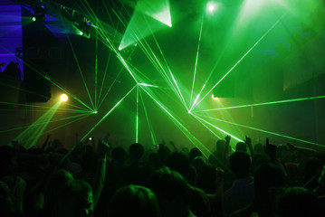 Fototapeta na wymiar laser lights at disco