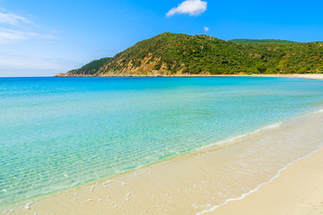 Fototapeta na wymiar Crystal clear water of Cala Pira beach, Sardinia island, Italy