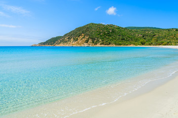 Fototapeta na wymiar Crystal clear water of Cala Pira beach, Sardinia island, Italy