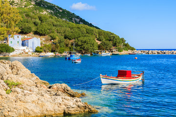 Fishing boats on blue sea in mountain landscape of Kefalonia island, Greece