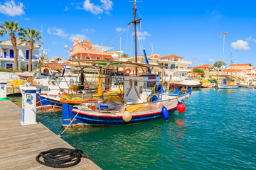 Colorful traditional Greek fishing boats in port of Lixouri town, Kefalonia island, Greece