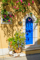 Fototapeta na wymiar Blue door of typical Greek house, Kefalonia island, Greece