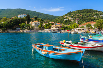 Fototapeta na wymiar Colorful Greek fishing boats in port of Kioni on Ithaka island, Greece