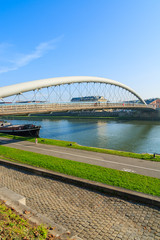 Bernatka bridge over Vistula river on sunny autumn day in city of Krakow, Poland