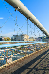 Bernatka bridge over Vistula river on sunny autumn day in city of Krakow, Poland