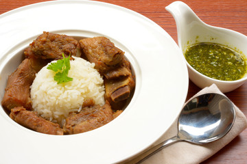 Grilled pork ribs with rice and spices