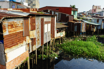 Colorful squatter shacks at Slum Urban Area in Ho Chi Minh City, Vietnam. Ho Chi Minh city (aka Saigon) is the largest city and economic center in Vietnam with population around 10 million people.