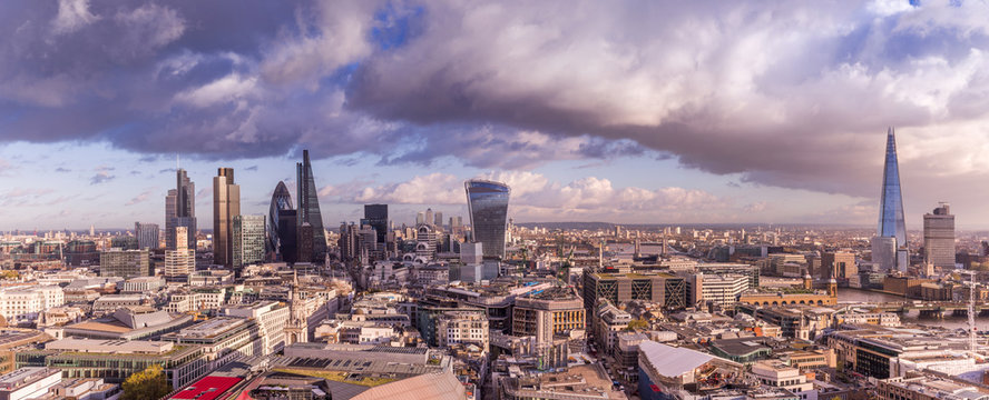 Panoramic skyline of London with Bank district including Stock Exchange Tower, Willis Building, Tower 42, Gherkin, Lloyd`s of London, the Shard and Canary Wharf at the background © zgphotography