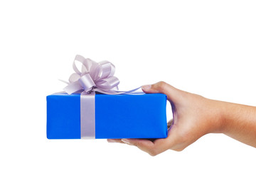 Asian hand giving a gift wrapped in blue box with silver ribbon and bow. the most beautiful gift isolated on white background