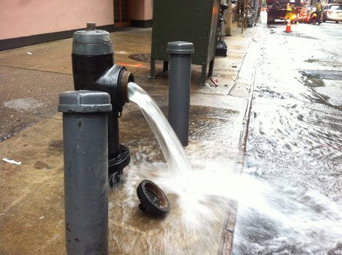 Open fire hydrant in Manhattan