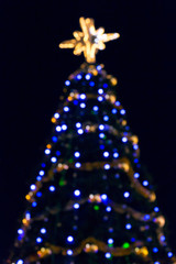 blurred christmas tree with colorful lights