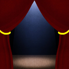 Dark room with red curtains and stage lighting
