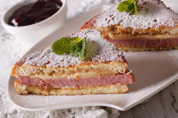 Monte Cristo sandwich close up and berry jam. horizontal
