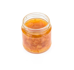 Orange homemade jam isolated on white background.