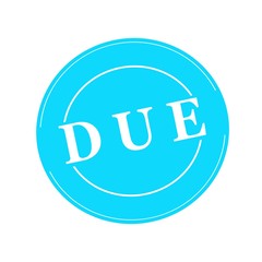 Due white stamp text on circle on blue background