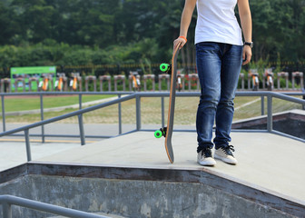 skateboarder woman at skatepark