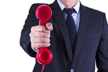 businessman with red phone