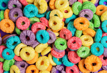  Colorful cereal  on a purple  background