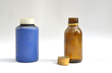 Dusty old  brown medicine bottle