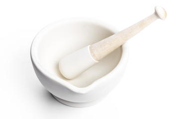 Mortar and Pestle on a plane background