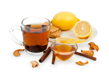 Tea, honey, lemon and cinnamon as cure for cold isolated on white background