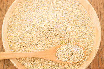 Quinoa grain in wooden plate
