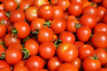 Small red tomatoes background