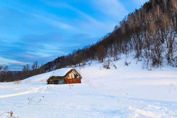 people driving  snowmobile in winter mountain 