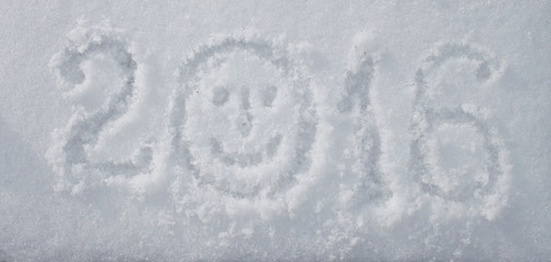 "2016" written on snow surface.