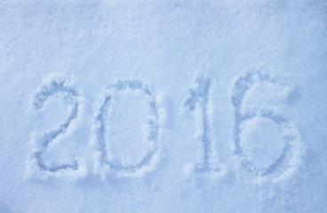 "2016" written on snow surface.