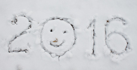 "2016" written on snow surface.