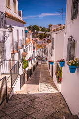 Obraz premium Picturesque street of Mijas. Charming white village in Andalusia
