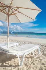 white umbrella on beach