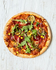 Delicious italian pizza served on wooden table