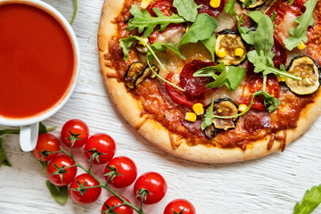 Delicious italian pizza served on wooden table