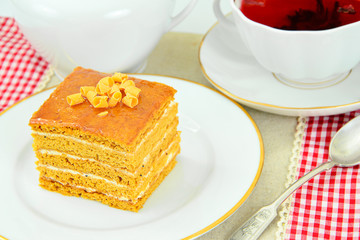 Cake with Condensed Milk, Nuts and Honey. Tea, Tableware.